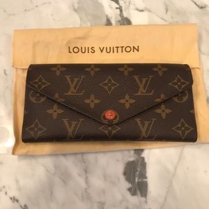 100% authentic Louis Vuitton wallet orange color